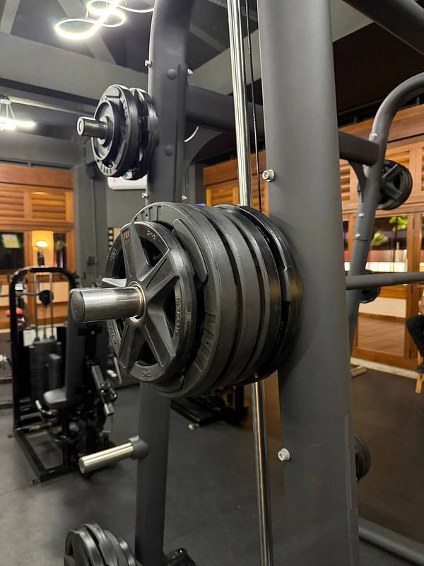 Interior of a gym with various fitness equipment in a Brazilian hotel.