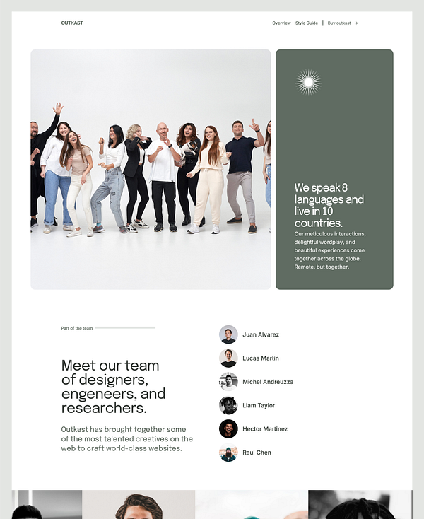 A diverse group of people poses together in a bright studio setting, showcasing a collaborative team spirit.