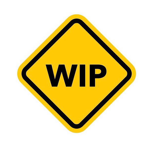 A yellow diamond-shaped traffic sign with the text 'WIP' in bold black letters.