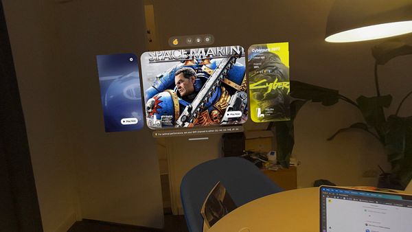 The image displays a spatial interface showcasing game options in a virtual environment.