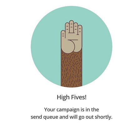 The image congratulates a campaign ready to be sent, featuring a raised cartoon hand illustration.