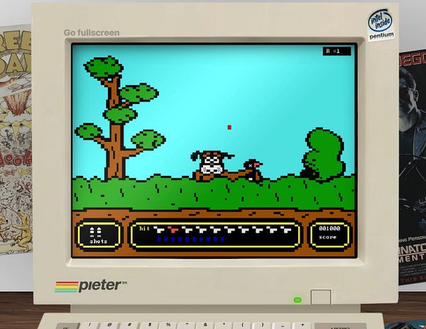 A retro computer screen displays a scene from the classic game Duck Hunt.