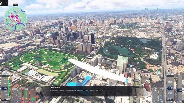 Aerial view of a cityscape in Bangkok, captured during a flight simulation in FS2024 on Xbox Cloud.