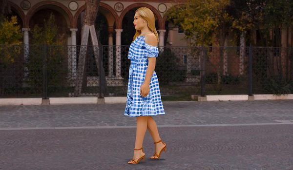 A woman in a blue and white checkered off-shoulder dress walks along a cobblestone path.