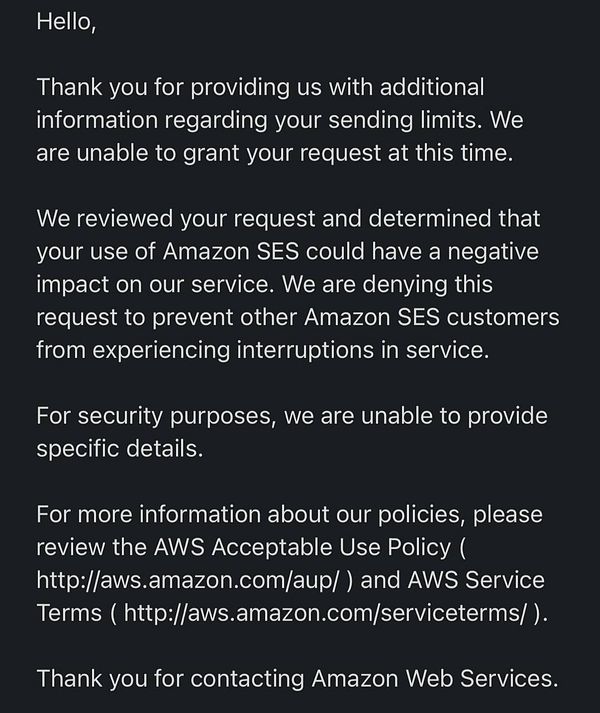 The image displays a denial notice from Amazon Web Services regarding a request for SES access.