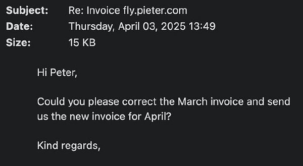 An email correspondence regarding an invoice correction request.