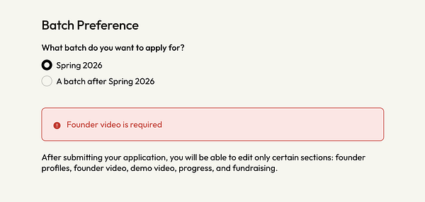 High-rise city skyline at sunset with residential and commercial buildings under a cloudy sky.