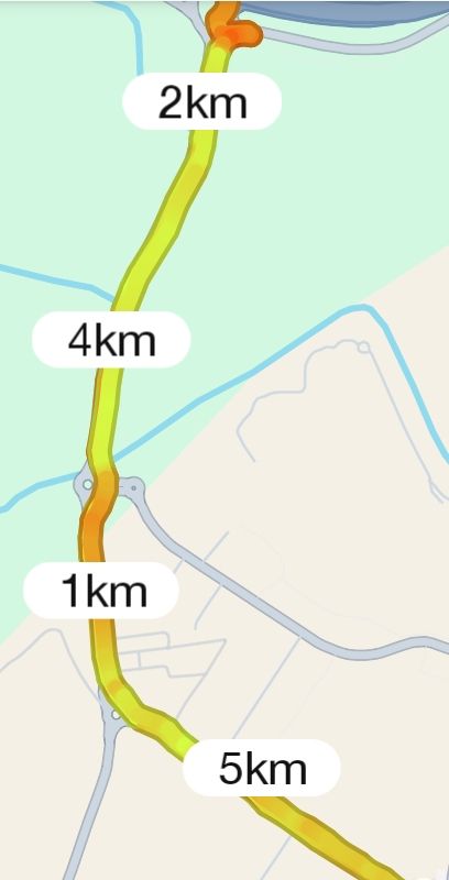 A map displaying a 5km running route with distance markers.