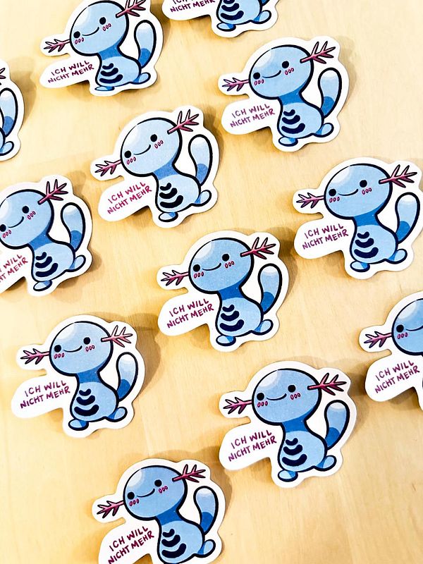 A collection of cute, cartoon-style stickers featuring a blue axolotl character with a playful expression.