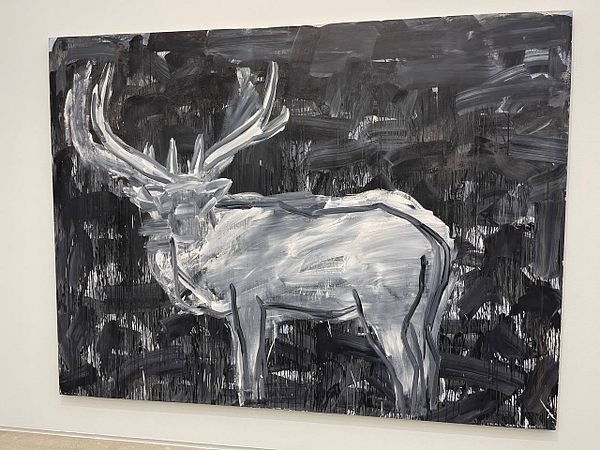 A large abstract painting of a deer against a dark background.