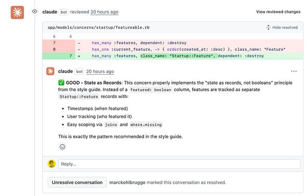 The image displays a GitHub pull request review with inline comments on a Ruby file related to a feature implementation.