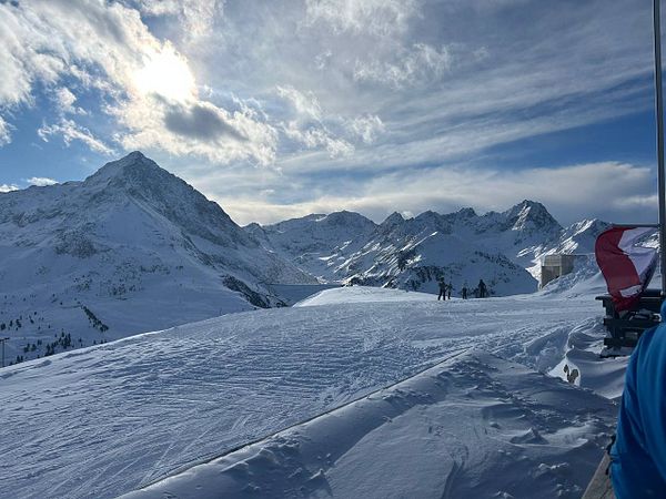 A detailed map of ski trails marked in red across a mountainous area, with additional topographical details and labels.