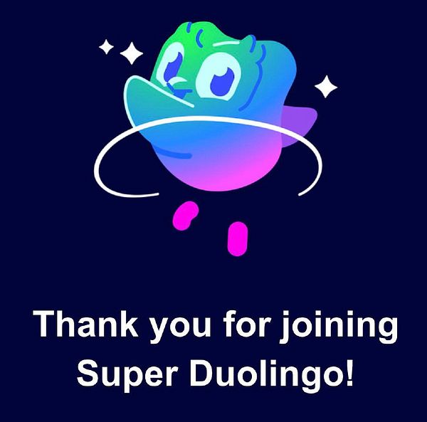 A colorful graphic celebrating the user's upgrade to Super Duolingo.