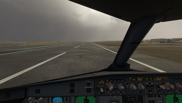 A gray commercial airplane on a foggy airport runway with no visible surroundings due to zero visibility conditions.