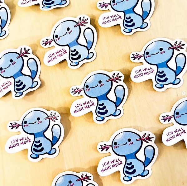 A collection of cute, cartoon-style stickers featuring a blue axolotl character with a playful expression.