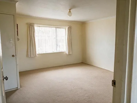 After: A lived-in living room, before and after being emptied for a listing