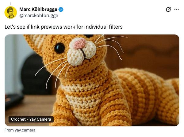 A crocheted cat toy is prominently displayed in the image.