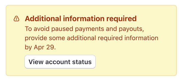 A notification alerting the user to provide additional information to avoid payment issues.