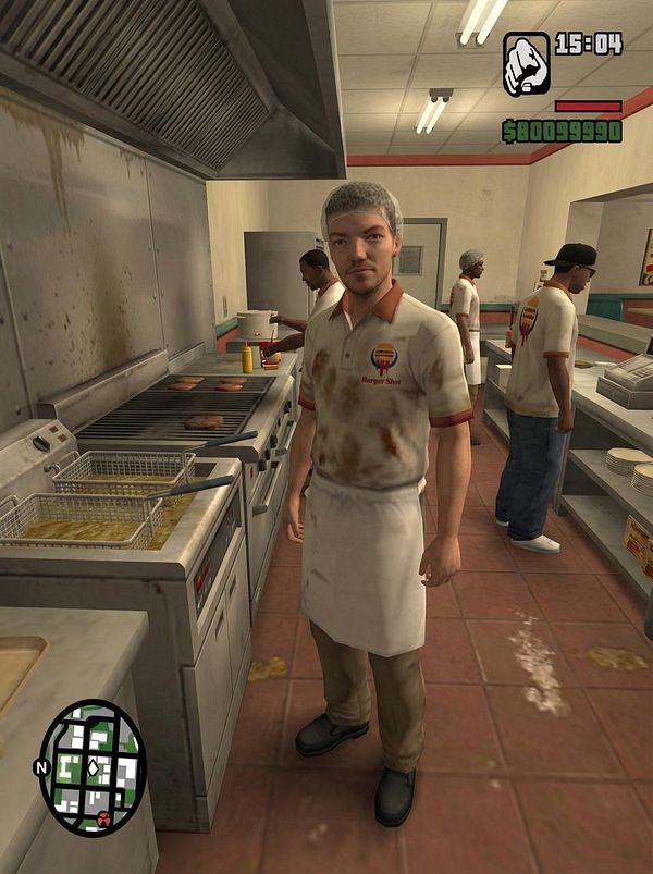 A character in a fast-food kitchen setting, wearing a stained uniform and apron.