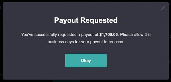 A confirmation message indicating a payout request of $1,700 has been successfully submitted.