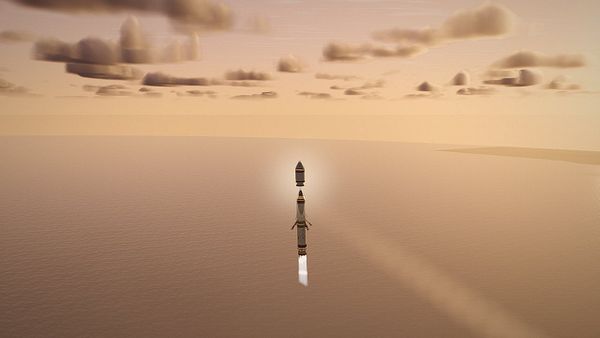 A rocket in mid-flight above an ocean with a calm sky and scattered clouds.