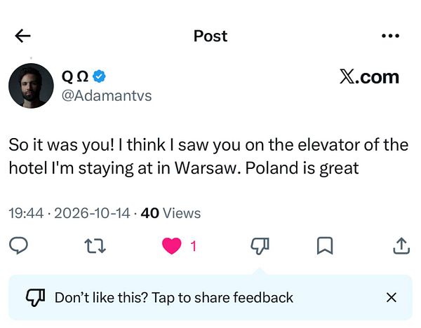 A social media post from user @Adamantvs mentioning a chance encounter in a Warsaw hotel elevator.