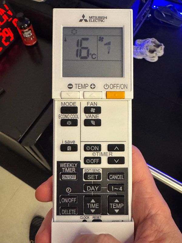 A Mitsubishi Electric air conditioning remote control displaying a temperature setting of 16°C.