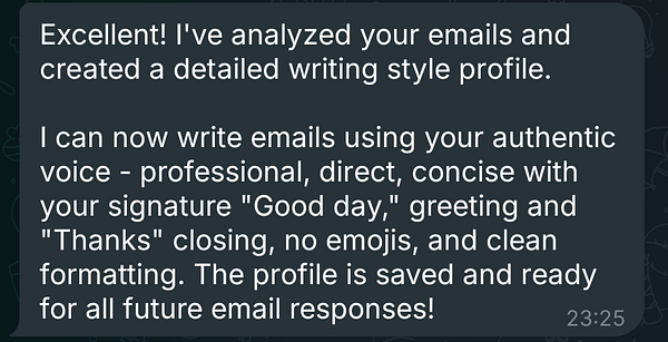 A cozy coffee cup with latte art of a smiling face sits on a wooden table next to a succulent plant in a woven pot.