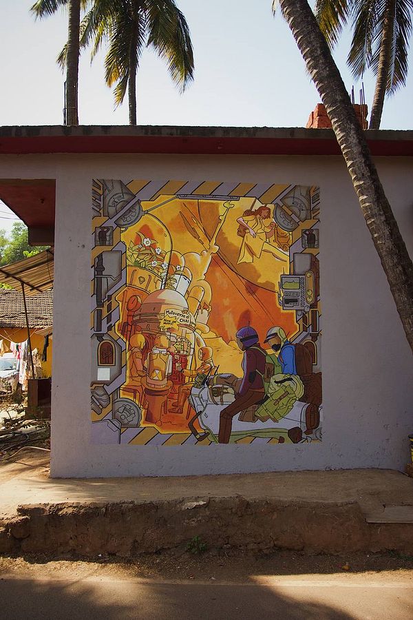 A vibrant mural depicting two characters in a futuristic setting, surrounded by mechanical elements.