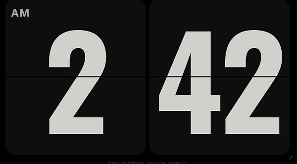A digital clock displaying the time as 2:42 AM is shown on a black background with the FlipClock.net watermark.