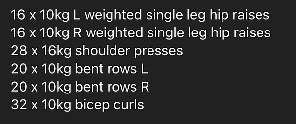 A list of exercises for a home gym workout is displayed on a dark background.