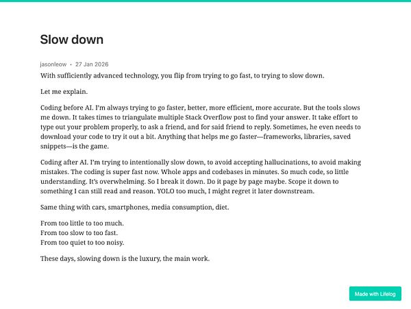 Scenic landscape photograph of a sunrise or sunset by a serene lake with reflections, framed by trees and hills.