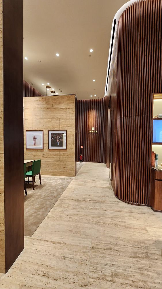 A luxurious interior of a Rolex boutique featuring elegant design elements.