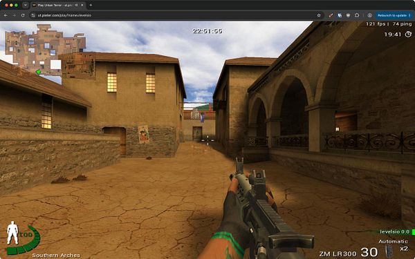 First-person view of a desert-themed map in the game Urban Terror with game HUD elements visible.