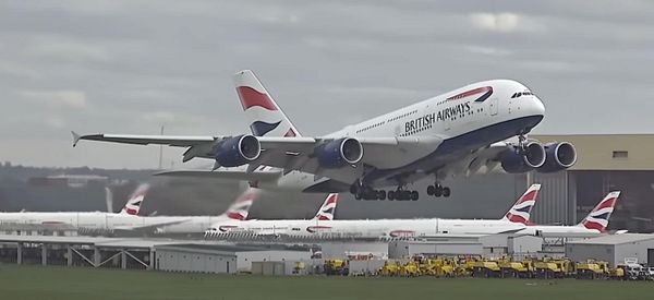A British Airways Airbus A380 is taking off from an airport runway.