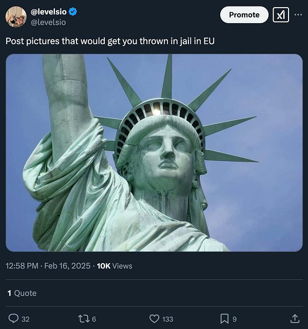 A close-up image of the Statue of Liberty against a clear blue sky.