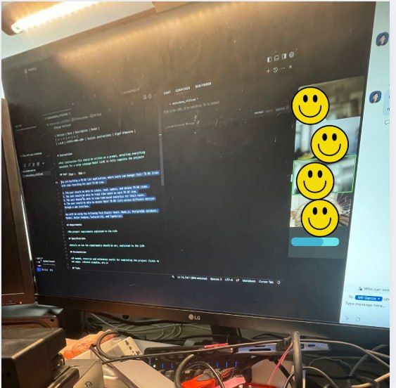 A computer screen displays coding work alongside a chat interface featuring smiley emojis.