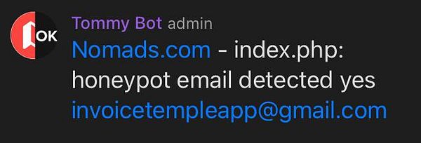 A notification from an admin bot indicating the detection of a honeypot email on a website.