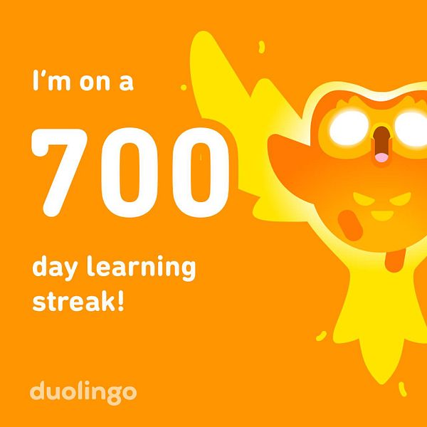 A vibrant graphic celebrating a 700-day learning streak on Duolingo.