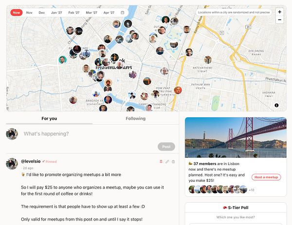 User interface of a social networking or meetups app displaying a city map with profile photo markers, a pinned post promoting meetup organizing, and a panel about members in Lisbon.
