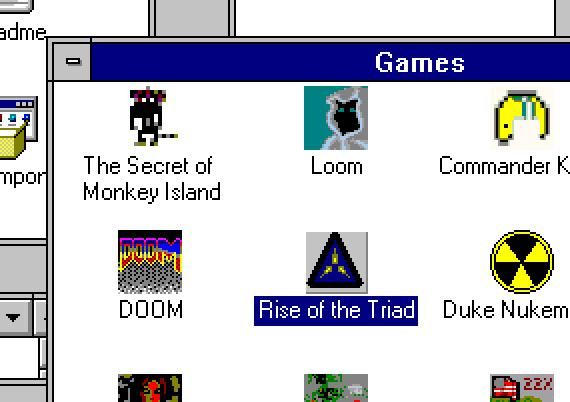 The image displays a retro computer interface showcasing a selection of video games.