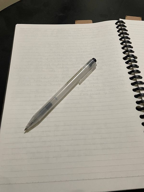 An artistic journal entry page titled "#life" with colorful handwritten text inside a stylized leaf shape, accompanied by decorative drawings and colors.