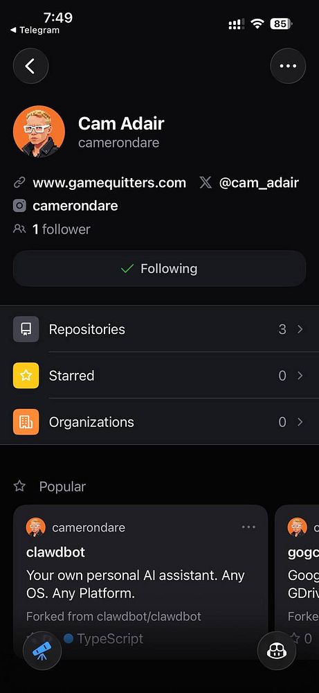 Illustration of a woman with short purple hair wearing headphones and a purple outfit, holding a white cat with orange patches, sitting among plants.