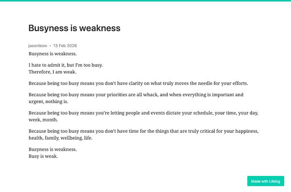 A foggy, empty sidewalk alongside a modern building, featuring intersecting paths, lamp posts, and a railing with partially visible text.