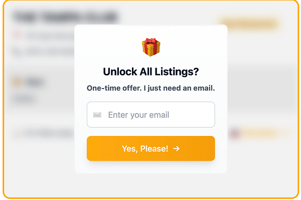A pop-up prompt offering a free premium search in exchange for an email address.