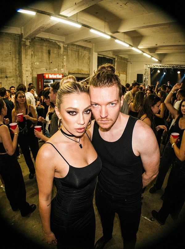 A digital artwork of a young man in traditional Japanese attire alongside a fierce tiger, combining elements of fantasy and cultural motifs.